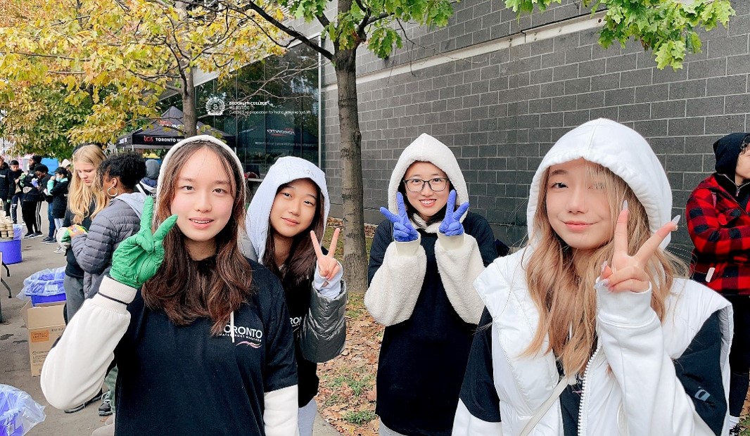Brooklyn College students volunteering in the community
